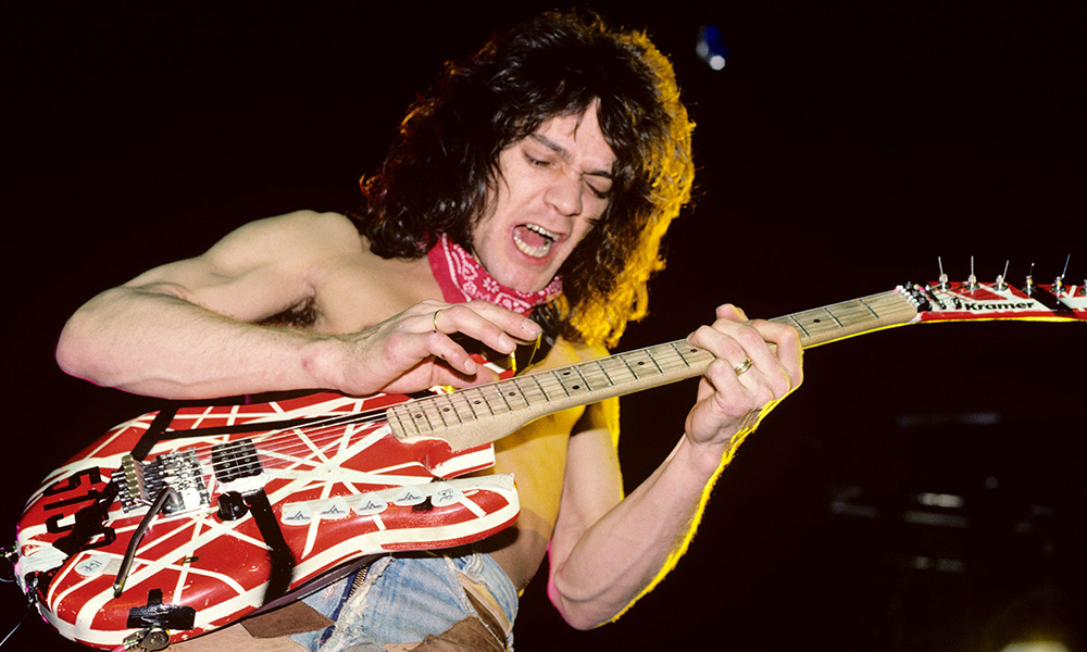 Eddie Van Halen playing his guitar.