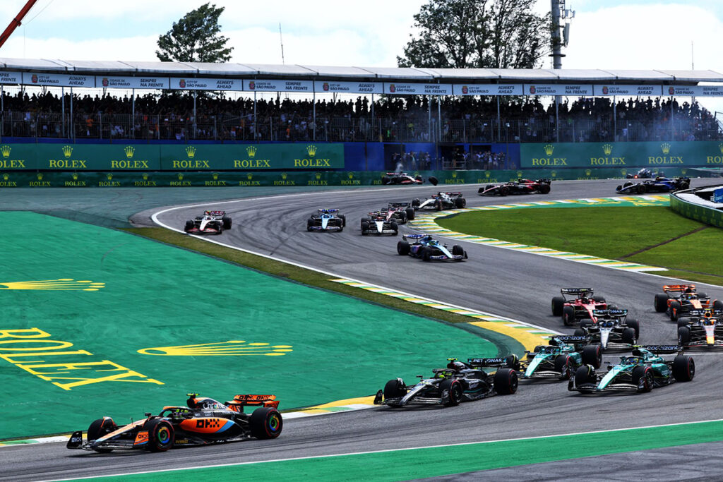 Cars going around Senna S in Brazil