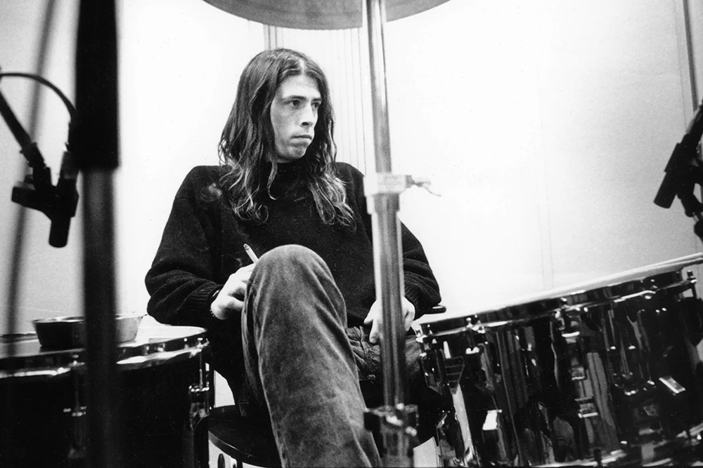 dave grohl sitting behind drums