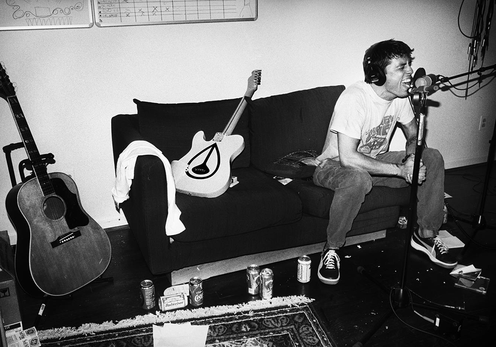 dave sitting on the couch singing